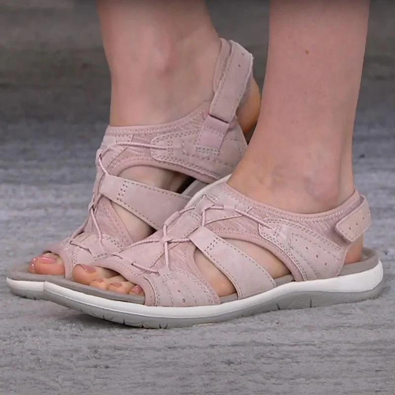 Zijaanzicht van de Ursula Orthopedische Sandaal in een lichte kleur, met nadruk op de ergonomische zool.
