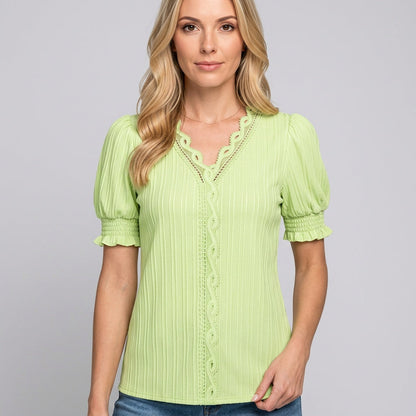 Luchtige Blouse met Knoopdetail en Comfortabele Pasvorm
